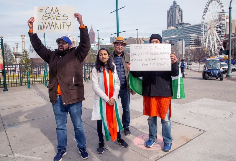 A  small group of Indians in support of the Citizen Amendment Act gather near CNN Center as a counterprotest during the Americans United for Justice in India rally  Sunday, January 26, 2020.  STEVE SCHAEFER / SPECIAL TO THE AJC