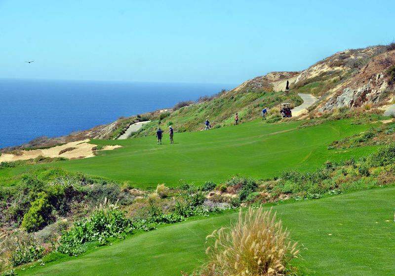 The course at Quivira Golf Club in Los Cabos, Mexico, features sheer granite cliffs, windswept dunes and a spectacular view of the Pacific Ocean. CONTRIBUTED BY WESLEY K.H. TEO