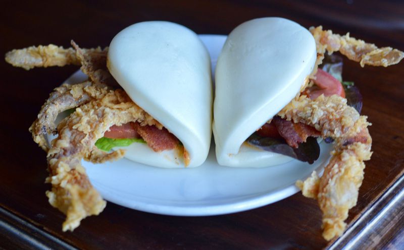 The soft-shell BLT banh bao at Le Fat in West Midtown. (photo: Henri Hollis for the AJC)