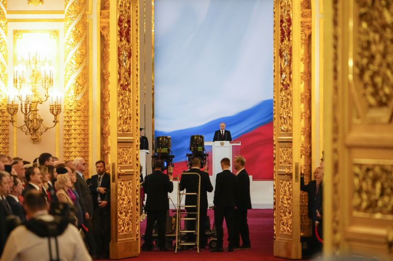 Vladimir Putin takes his oath as Russian president during an inauguration ceremony in the Grand Kremlin Palace in Moscow, Russia, Tuesday, May 7, 2024. (AP Photo/Alexander Zemlianichenko, Pool)