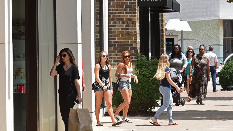 Avalon, a mixed-use development in Alpharetta, received nearly $2.6 million in property tax breaks last year. Customers visit Avalon’s theater, restaurants and stores on Thursday, August 17, 2017. HYOSUB SHIN / HSHIN@AJC.COM