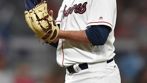 Braves reliever takes a breather during a  four-inning relief stint earlier this season. He struck out six of seven batters he faced Friday at St. Louis. (AP Photo/Richard Hamm)