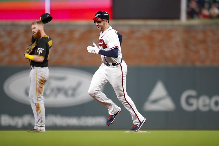 Photos: Fireworks early, late for Braves in big win over Pirates