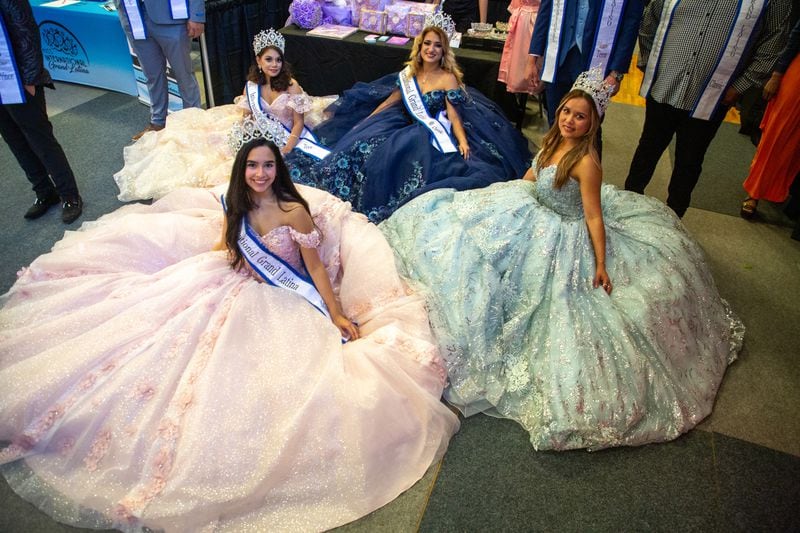 
Winners of the Miss International Grand Latina pageant pose for photos after modeling dresses at the Gwinnett County's annual Quince Girl Expo at Best friends Park Sunday, March 20, 2022.  STEVE SCHAEFER FOR THE ATLANTA JOURNAL-CONSTITUTION
