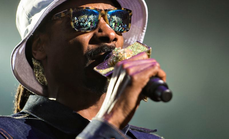 April 17, 2015 Atlanta - Snoop Dogg performs on stage during the SweetWater 420 Fest at Centennial Olympic Park in Atlanta on Friday, April 17, 2015. The first day of the three day music festival featured Snoop Dogg, Thievery Corporation, Beats Antique, Aer and Big Data. JONATHAN PHILLIPS / SPECIAL Bow wow wow, yippee yo yippie yay. JONATHAN PHILLIPS / SPECIAL