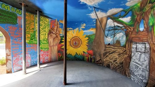 Fabian Williams and Karen Anderson Singer (of Tiny Doors Atlanta) created this in-the-round mural in an old building that developers saved when clearing land for the Penman Apartments in Grant Park. Courtesy of Arthur Rudick