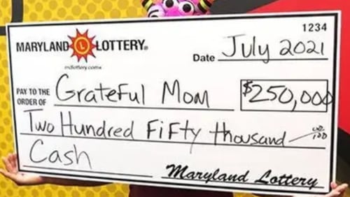 An Uber Eats delivery driver from Maryland was waiting for her next job when she received an unexpected bonus: a $250,000 prize on a $10 scratch-off lottery ticket. (Image: The Maryland Lottery)