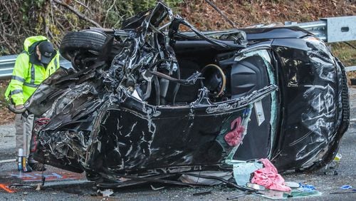 Two women were killed and a man was critically injured when their vehicle was rear-ended on I-285 in DeKalb County early Monday morning, authorities said.