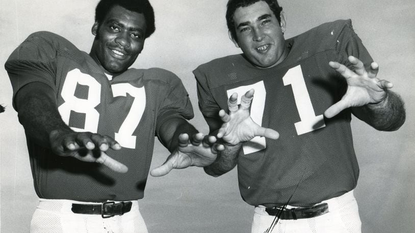 John Zook (right) strikes a pose with fellow Falcons defensive end Claude Humphrey in 1972.  (AJC Archive/Charles R. Pugh/staff)