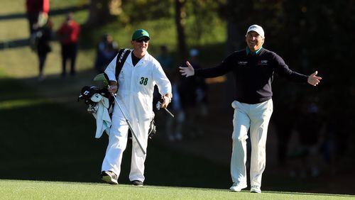 Fred Couples exults over hitting it close on No. 18 Friday at the Masters. His birdie there completed a second-round 70. (Curtis Compton/ccompton@ajc.com)