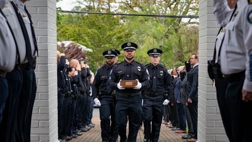 Police officers from multiple agencies and Roswell city officials gathered Thursday morning to honor the life and service of K-9 Edo.