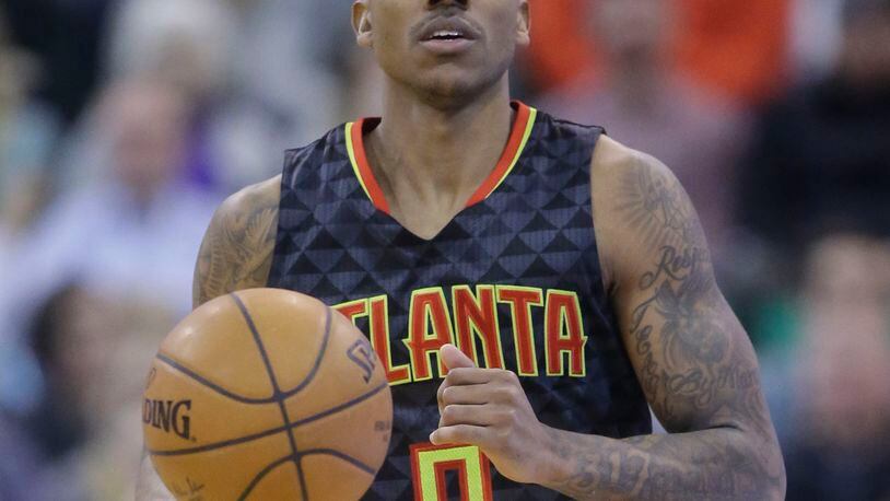 Atlanta Hawks guard Jeff Teague (0) brings the ball up court during the second half in an NBA basketball game against the Utah Jazz Tuesday, March 8, 2016, in Salt Lake City. The Hawks won 91-84. (AP Photo/Rick Bowmer)