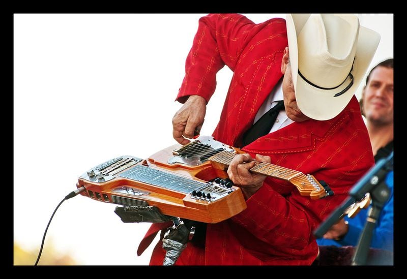 “Wire & Wood: Designing Iconic Guitars” at the Museum of Design Atlanta looks at the craft behind creating guitars and the iconic musicians, like Junior Brown, who play them. Photo credit Vince Dudzinski
