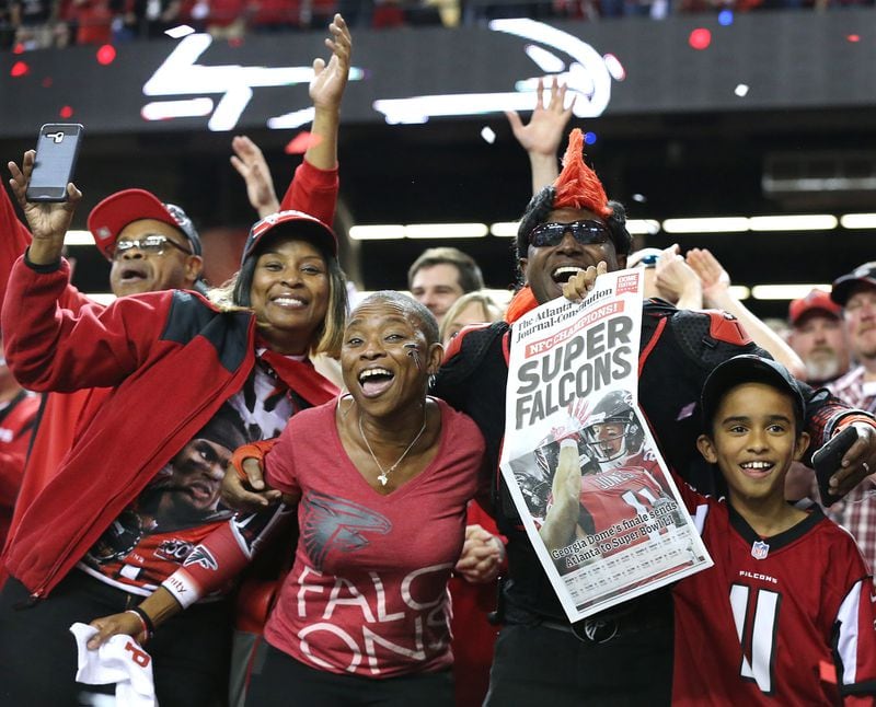 Falcons fans celebrate at the end of the team's 44-21 victory over the Green Bay Packers in the NFC championship game Jan. 22, 2017. It was the final game in the Georgia Dome. Curtis Compton/ccompton@ajc.com