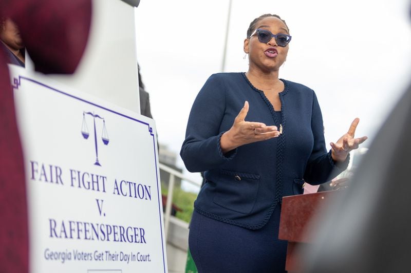 Allegra Lawrence-Hardy, an attorney for Fair Fight Action, speaks outside the Richard B. Russell Federal Building in Atlanta in April 2022 as a trial began in a suit the group filed against Georgia Secretary of State Brad Raffensperger. A Politico investigation found that Fair Fight spent more than $25 million on legal fees over 2021 and 2022, but it suffered a number of losses in court. (Jenn Finch for the AJC)