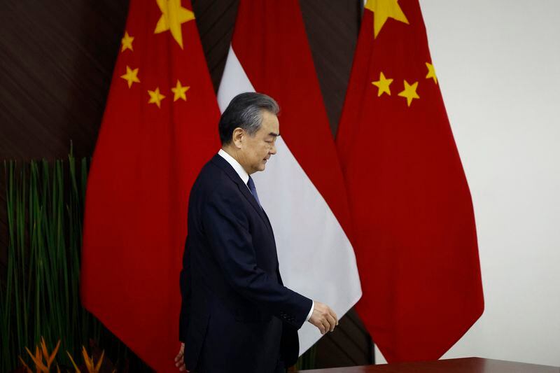Chinese Foreign Minister Wang Yi arrives for a bilateral meeting with Indonesian Foreign Minister Retno Marsudi in Jakarta, Indonesia, Thursday, April 18, 2024. (Willy Kurniawan/Pool Photo via AP)