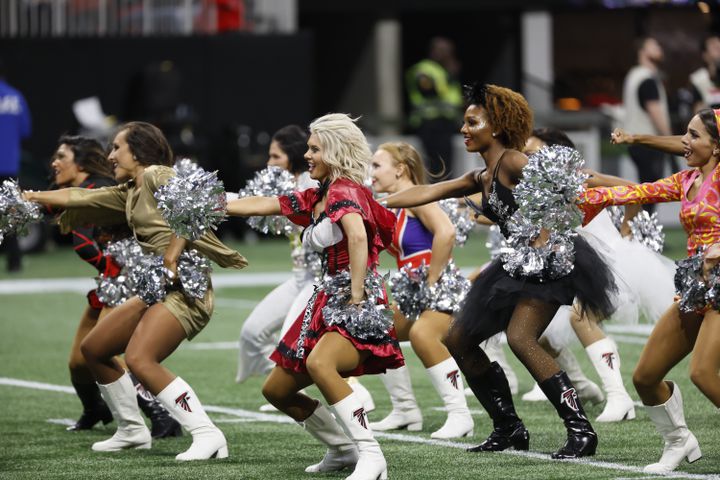 Falcons cheerleaders perform in Halloween costumes during a break in the fourth quarter Sunday in Atlanta.
 (Miguel Martinez / miguel.martinezjimenez@ajc.com)