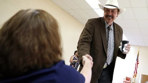 Democratic congressional candidate Rob Quist greets supporters Monday in Great Falls, Mont. Quist is campaigning throughout Montana ahead of a special election Thursday to fill Montana’s single congressional seat. Quist, a folk musician and political novice, is in a tight race against Republican Greg Gianforte. (Photo by Justin Sullivan/Getty Images)