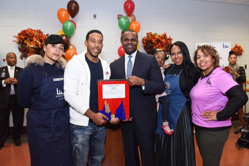  Atlanta Mayor Kasim Reed presents an official congratulations on behalf of the City of Atlanta. Photos: Courtesy of the Ludacris Foundation