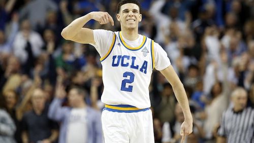 UCLA's Lonzo Ball (2) celebrates after hitting a 3-point basket late in the second half against Oregon at Pauley Pavilion in Los Angeles on February 9, 2017. (Gary Coronado/Los Angeles Times/TNS)