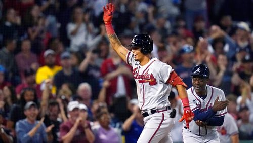 Atlanta Braves' Vaughn Grissom celebrates while running the bases on his two-run home run against the Boston Red Sox during the seventh inning of a baseball game Wednesday, Aug. 10, 2022, in Boston. At right is Braves third base coach Ron Washington. (AP Photo/Charles Krupa)