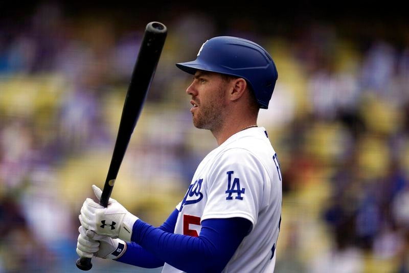 Los Angeles Dodgers' Freddie Freeman looks on from the on-deck circle during the first inning of a baseball game against the Atlanta Braves Wednesday, April 20, 2022, in Los Angeles. (AP Photo/Marcio Jose Sanchez)