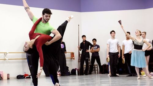 Atlanta Ballet artists Erica Alvarado and Sergio Masero-Olarte rehearse as Kitri and Basilio in Yuri Possokhov’s “Don Quixote.” CONTRIBUTED BY CHARLIE MCCULLERS
