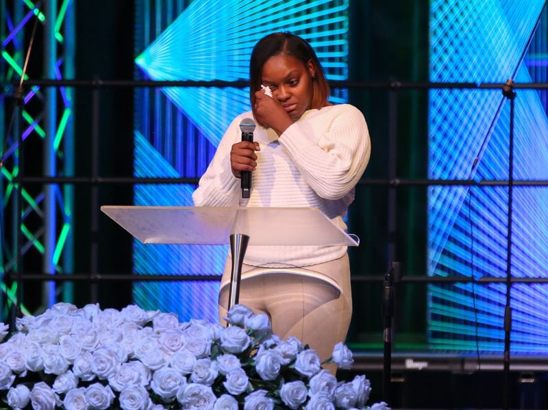 Deajia Kershaw, Crawford’s freshman year suitemate at Clark Atlanta University, wipes a tear while speaking during a funeral service in Athens for Alexis Janae Crawford, a slain 21-year-old senior attending Clark Atlanta University.