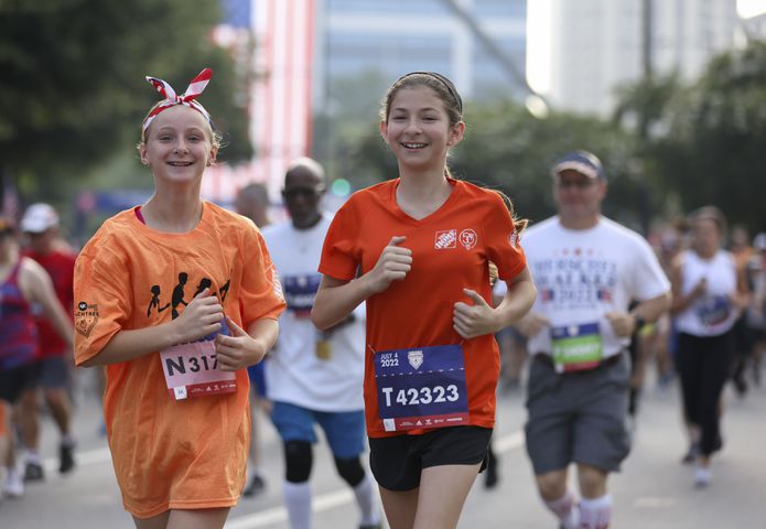 Runners at the 53rd running of the Atlanta Journal-Constitution Peachtree Road Race in Atlanta on Monday, July 4, 2022. (Jason Getz / Jason.Getz@ajc.com)