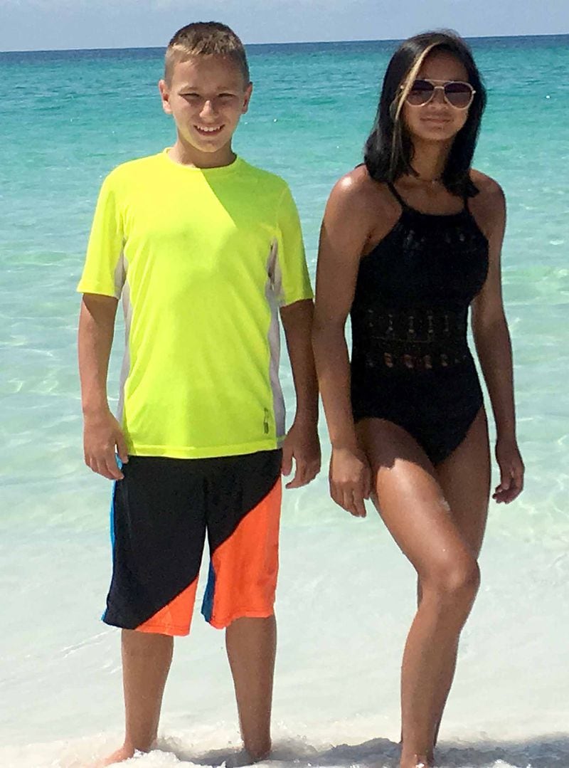 Kincaid (left) and Olivia Eaker visited the beach earlier this year with family friends. (Family photo)