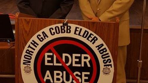 (L-R) Jason Marbutt is the new chairman of the North Georgia/Cobb Elder Abuse Task Force, replacing Cobb District Attorney Vic Reynolds who will remain on the task force. Courtesy of North Georgia/Cobb Elder Abuse Task Force