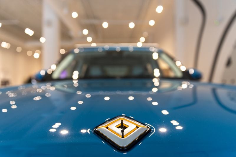 A Rivian R1T truck is seen at a media event marking the opening of the company’s new showroom at Ponce City Market in Atlanta on Thursday, October 19, 2023. (Arvin Temkar / arvin.temkar@ajc.com)