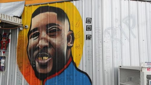 A mural in memory of Alton Sterling on the wall of a convenience store in Baton Rouge, Louisiana. Police on Friday released the body cam video of Sterling’s killing.