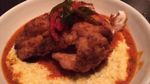 Grouper & Grits at Simon’s Restaurant is a rich mess of fish in a puddle of rich cheesy grits. CONTRIBUTED BY WENDELL BROCK