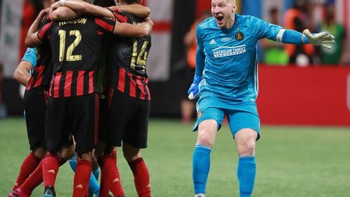 August 27, 2019 Atlanta: Atlanta United goalkeeper Brad Guzan runs to the celebration as time expires in a 2-1 victory over Minnesota United to win the U.S. Open Cup on Tuesday, August 27, 2019, in Atlanta.  Curtis Compton/ccompton@ajc.com