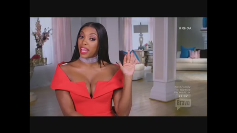  Porsha cut her hair  in September but this scene was obviously shot months later as it grew out again.