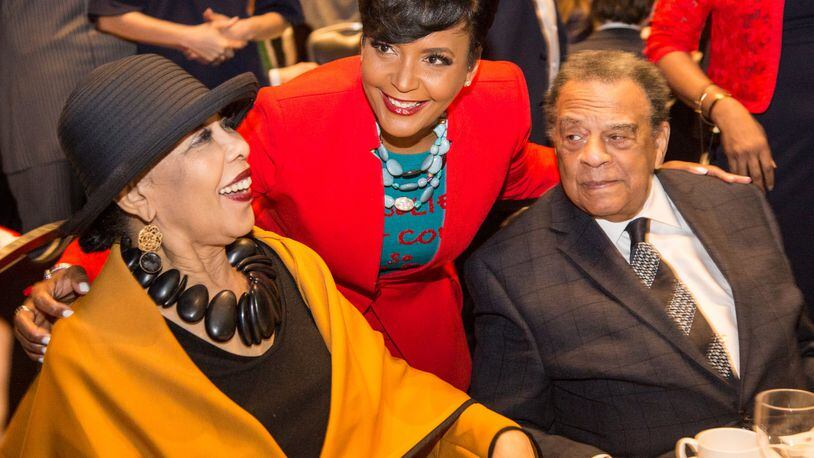Keisha Lance Bottoms, Mayor of Atlanta (center) poses with Caroline Young and Ambassador Andrew Young at the State of the City Business Breakfast at the Georgia World Congress Center in Atlanta on Tuesday. (Photo by Phil Skinner)