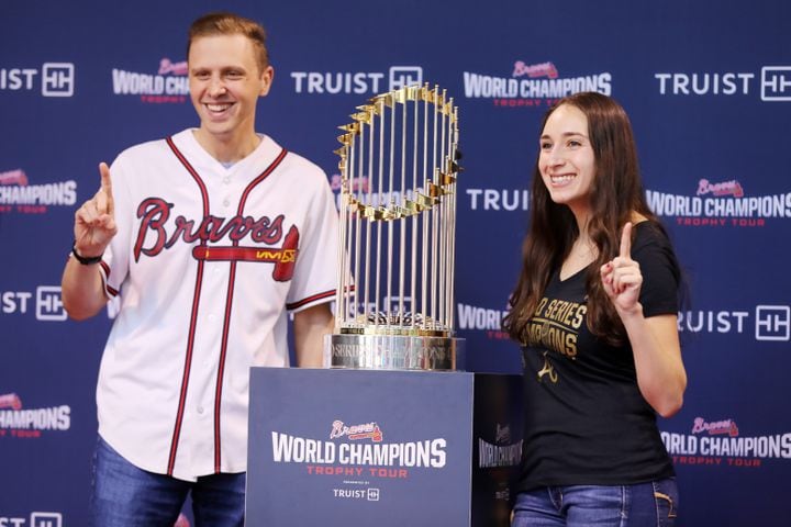 Isaac Feiner celebrated his birthday with Kate Battaglia and the trophy. Miguel Martinez for The Atlanta Journal-Constitution 