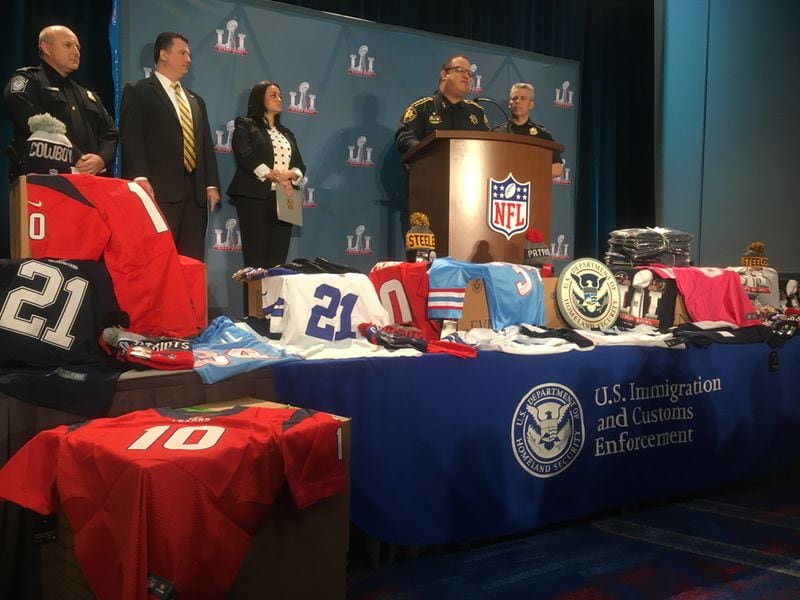  This merchandise is all fake. The joint law enforcement efforts to crack down on counterfeiting is real. Photo: Jennifer Brett
