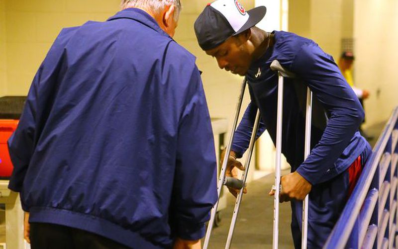 Melvin Upton will have to wait at least a couple of months before he's ready to resume his efforts to put the past two miserable seasons behind him. He's got a foot injury and was in a cast Saturday. (Curtis Compton/AJC photo)