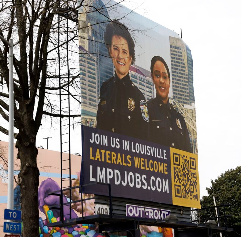 The image of former Atlanta police chief Erika Shields and current chief of police of the Louisville Metro Police Department is seen on a billboard recruiting police officers down the street from police headquarters In Atlanta on Tuesday, March 15, 2022. (Bob Andres / robert.andres@ajc.com)
