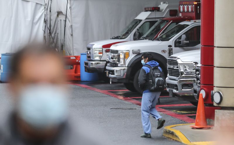 The ambulance bay at Grady EMS was full Friday morning. Concerns from a surge of COVID-19 cases has health officials alarmed. (John Spink / John.Spink@ajc.com)



