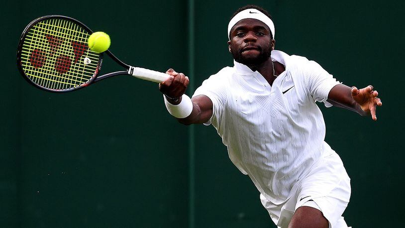Frances Tiafoe of The United States plays a forehand in his Men's Singles first round match against Fabio Fognini of Italy during Day two of The Championships - Wimbledon 2019 at All England Lawn Tennis and Croquet Club on July 02, 2019 in London, England. (Photo by Laurence Griffiths/Getty Images)