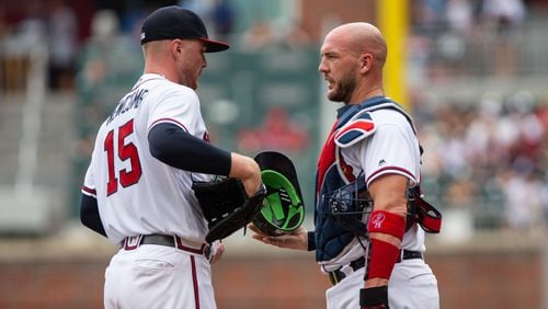 Catcher Tyler Flowers  of the Atlanta Braves talks things over with pitcher Sean Newcomb of the Atlanta Braves after Newcomb gave up three runs in the first inning to the Washington Nationals at SunTrust Park on September 16, 2018 in Atlanta, Georgia.(Photo by Kelly Kline/GettyImages)