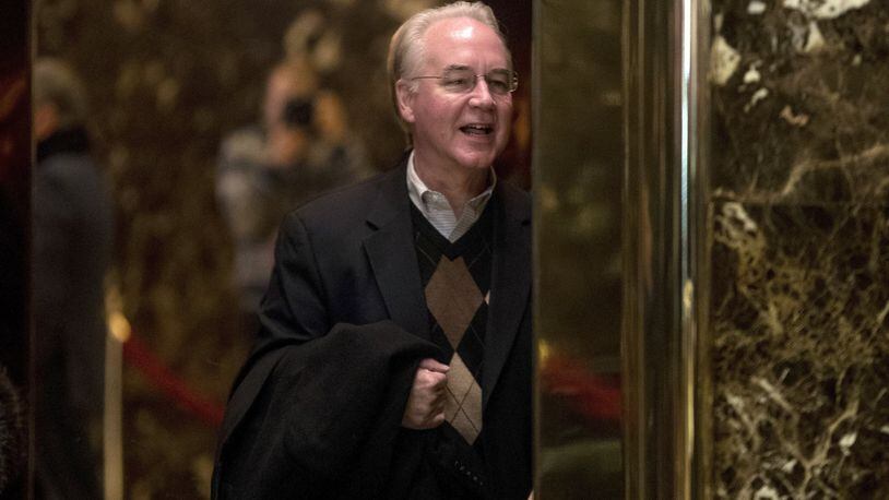 Rep. Tom Price, R- Ga. arrives at Trump Tower in New York in December. President-elect Donald Trump’s nominee to be the nation’s top health official is facing calls for investigation of whether his stock picks were guided by insider knowledge gleaned as a senior member of Congress. AP PHOTO / ANDREW HARNIK