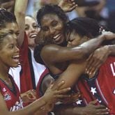Nikki McCray (from left), Lisa Leslie and Venus Lacey, of the U.S., celebrate during the Team USA women's 111-87 victory over Brazil to win the gold medal Sunday, Aug. 4, 1996, at the Georgia Dome at the 1996 Centennial Olympic Games in Atlanta. (Rick Stewart /Allsport)