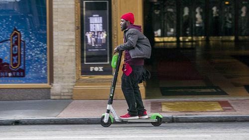 Electric scooters have been popping up across metro Atlanta since last spring. Local governments are scrambling to enact rules for their use. (ALYSSA POINTER/ALYSSA.POINTER@AJC.COM)