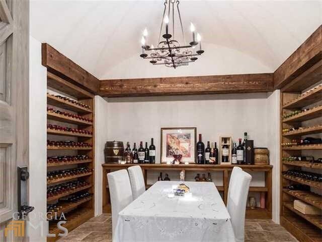 A must for the well-appointed French Provincial estate: a dine-in wine cellar