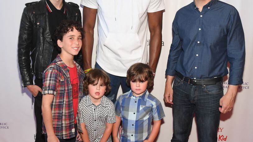 Actor Charlie Wright, from left, actor Jason Drucker, twins Dylan and Wyatt Walters, Atlanta Hawks player Dwight Howard and author Jeff Kinney attend the"Diary Of A Wimpy Kid: The Long Haul" Atlanta screening hosted by Dwight Howard at Regal Atlantic Station. Photo by Paras Griffin/Getty Images for D12 Foundation