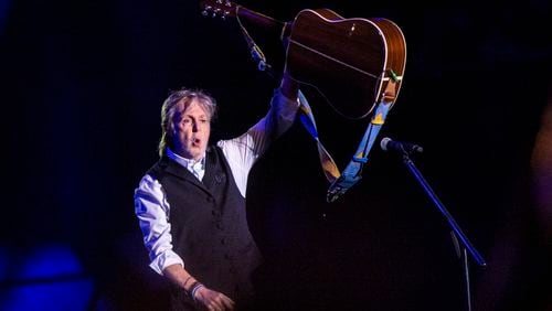 FILE - Paul McCartney performs at Glastonbury Festival in Worthy Farm, Somerset, England, on June 25, 2022. With an assist from Paul McCartney, the Paralympic Games starts its 100-day race Monday to the opening ceremony in Paris in August. (Joel C Ryan/Invision/AP, File)